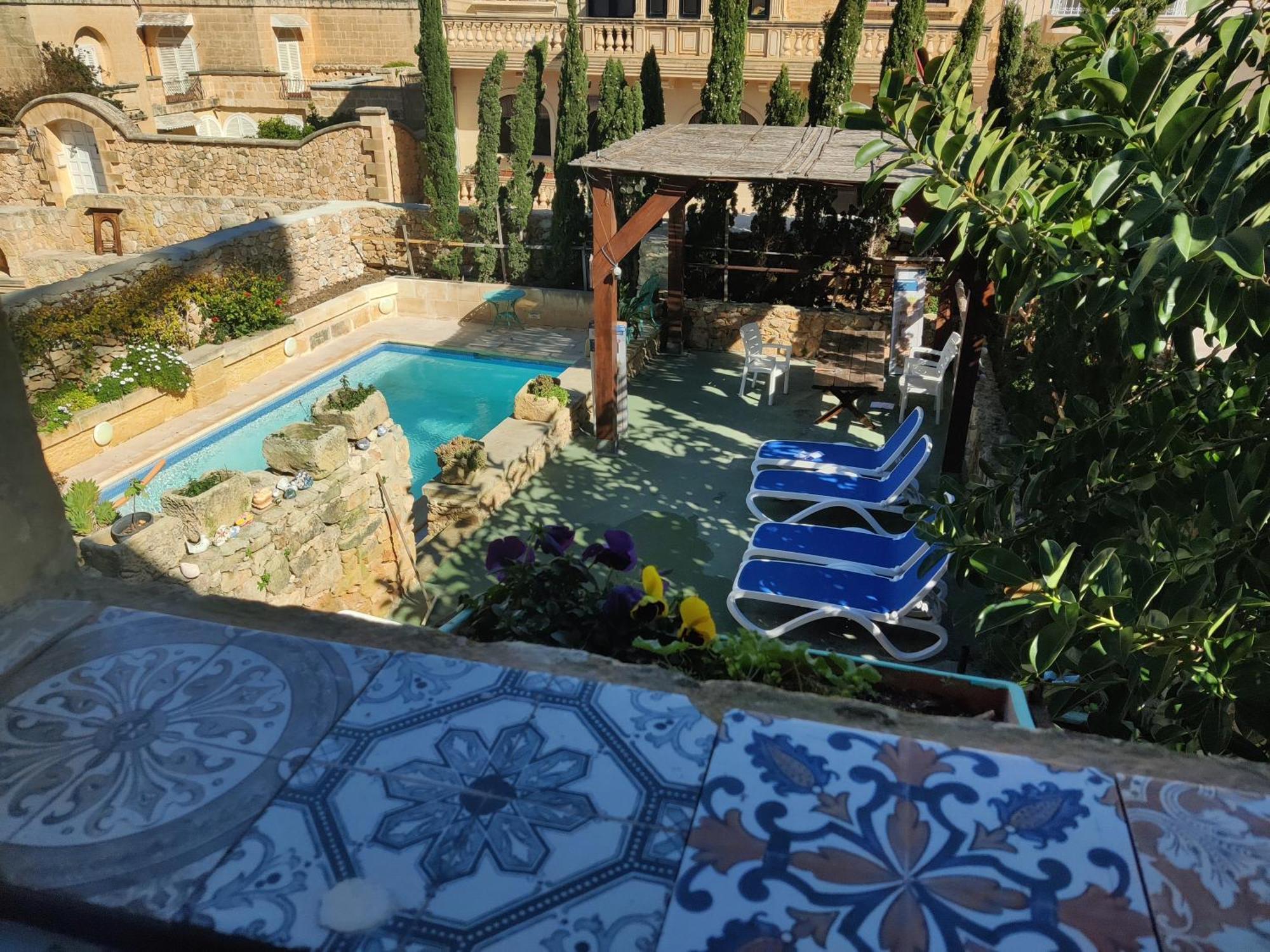 The Garden Gate Bed & Breakfast Sannat Стая снимка